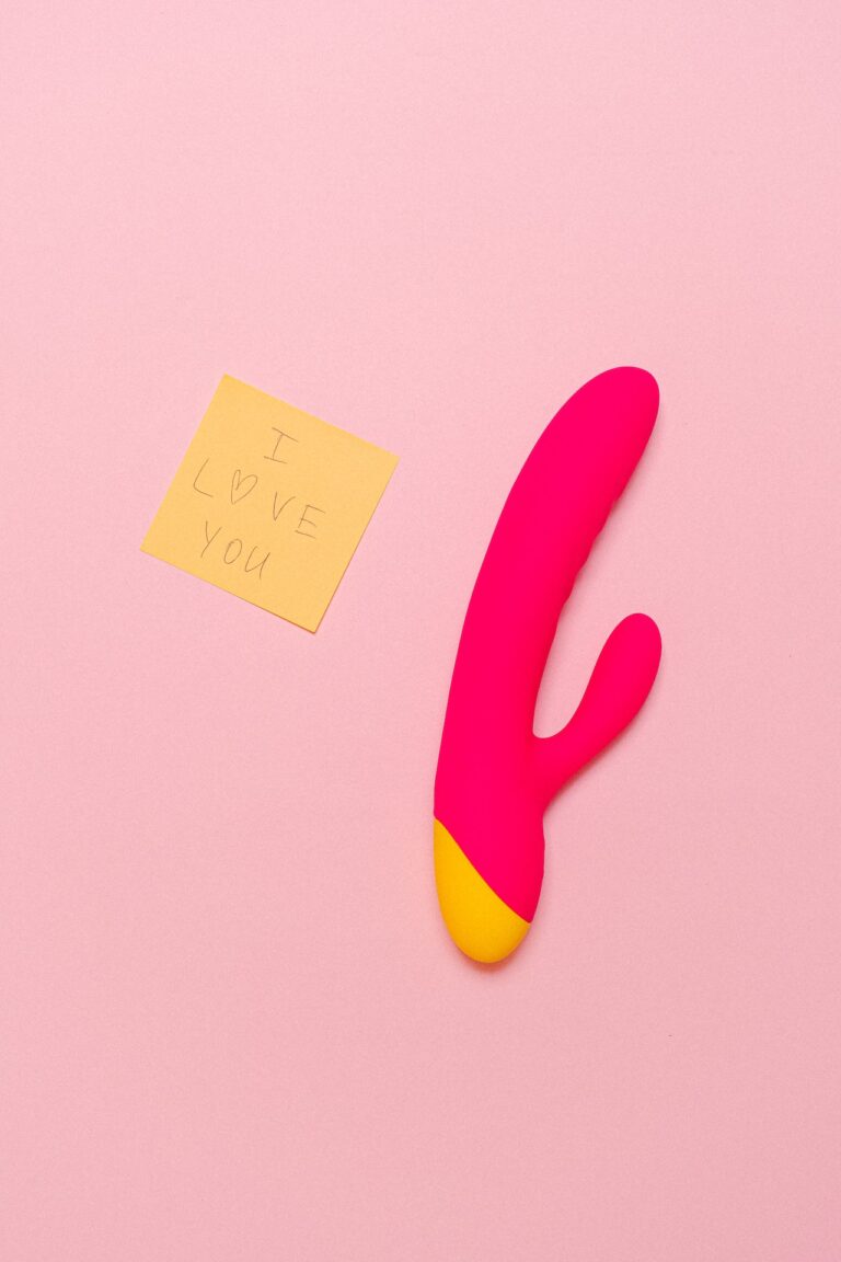 A double penetration didlo and a sticky note saying i love you